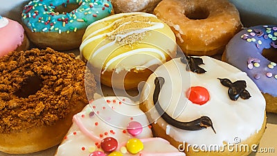 Colorful donuts with attractive designs Stock Photo