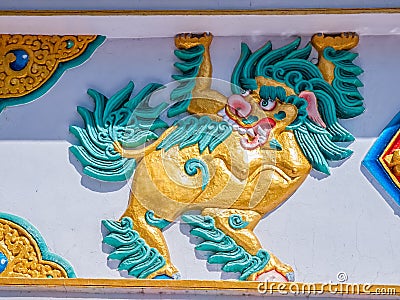 Colorful dragon relief in Dharamsala Stock Photo