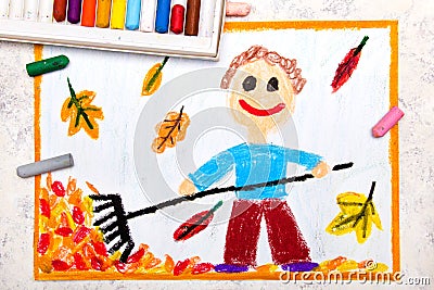 drawing: A smiling boy is raking leaves Stock Photo