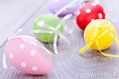 Colorful easter egg decoration on wooden background Stock Photo