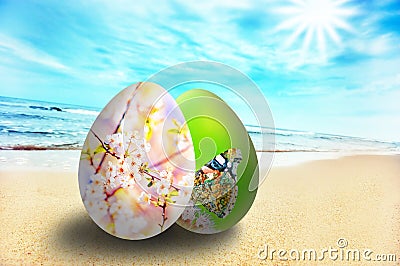 Colorful easter eggs on sunny beach Stock Photo