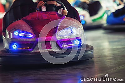 Colorful electric bumper car in autodrom in the fairground attractions at amusement park Stock Photo