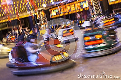 Colorful electric bumper car in the fairground attractions at amusement park. Editorial Stock Photo