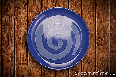 Colorful empty plate on grungy background table Stock Photo