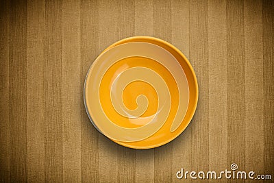 Colorful empty plate on grungy background table Stock Photo