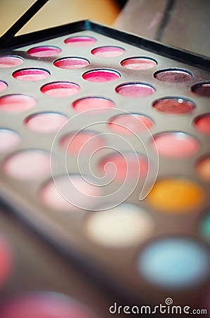 Colorful eye shadows palette. Blured Makeup background Stock Photo