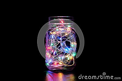 Colorful Fairy Light in Mason Jar. Stock Photo