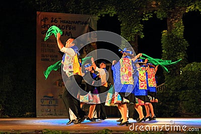 Colorful fancy dressed traditional dancers from Peru Editorial Stock Photo