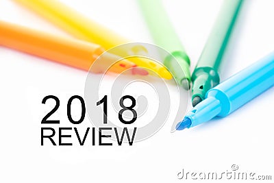 Colorful felt-tip pen and 2018 review word on white background Stock Photo