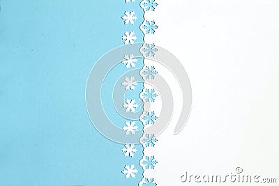 Colorful festive background with cut out snowflakes Stock Photo