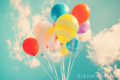 Colorful festive balloons over blue sky Stock Photo