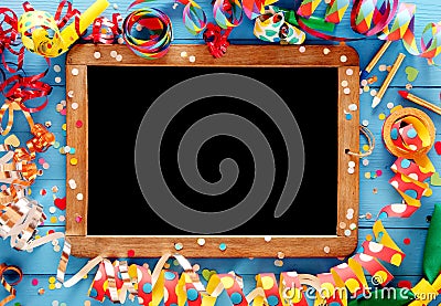 Colorful festive frame around a vintage slate Stock Photo