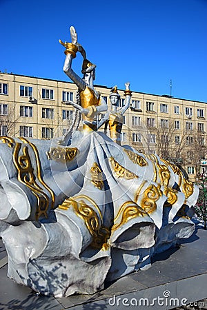 Colorful figures featuring dancing women in Astana Editorial Stock Photo