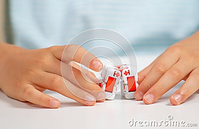 Colorful fingers antistress toy in child hand Stock Photo