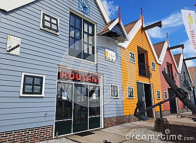 Colorful fishermen’s cottages at the harbour in Zoutkamp, Groningen Editorial Stock Photo