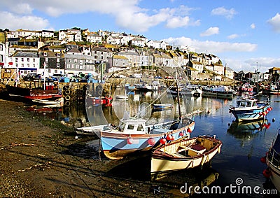 Colorful fishing boats at anchor in Mevagissey Stock Photo