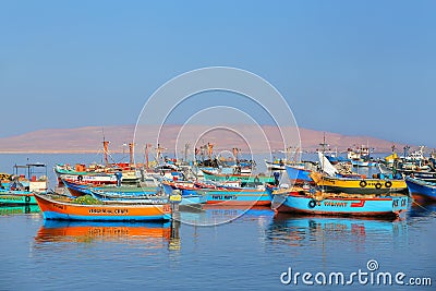 Colorful fishing boats anchored in Paracas Bay, Peru Editorial Stock Photo