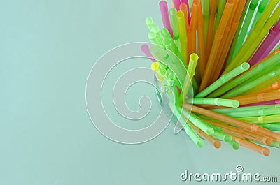 Colorful flexible drinking straws in glass Stock Photo