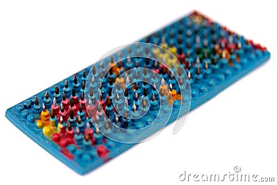 Colorful flexible massager with magnetic steel spikes Stock Photo