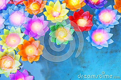 Colorful flower light candle float in the water Stock Photo