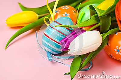 Colorful flowering beautiful bouquet of tulips and eastern egg Stock Photo