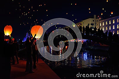 colorful flying lanterns, super spectacle in the beautiful city of Volos, Greece Editorial Stock Photo