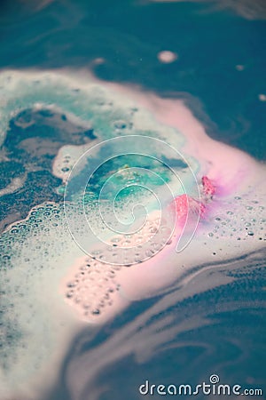 Colorful foam and bubbles in the bath blue water Stock Photo