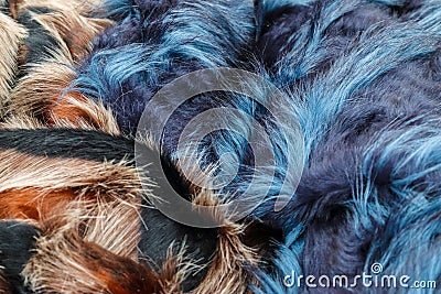 Colorful folded textile and fabric texturs in a close up view Stock Photo