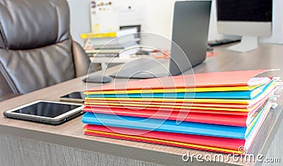 Folders stack on manager table. Stock Photo