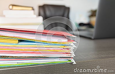 Pile of colorful folders workload Stock Photo