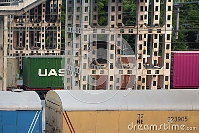 The colorful freight train carriages standing at the station in India Editorial Stock Photo