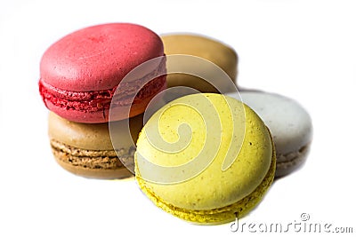 Colorful french macaroons on the blue table close up view Stock Photo