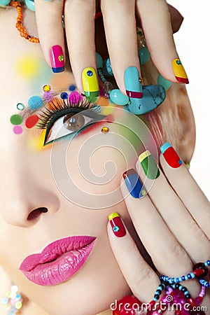 Colorful French manicure and makeup. Stock Photo