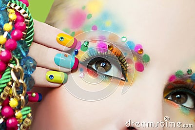 Colorful French manicure and makeup. Stock Photo