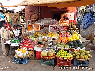 Colorful fruit stall in the street of Delhi, India Editorial Stock Photo