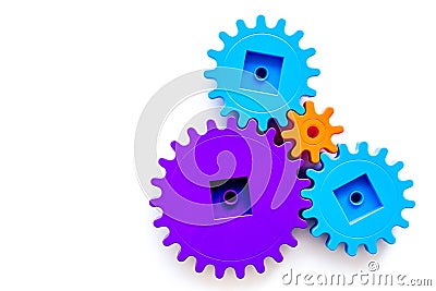 Colorful gears for ideal team work technology white table background top view mock-up Stock Photo