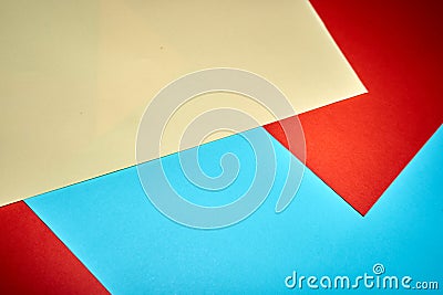 Colorful geometric texture paper pattern in yellow, blue, red Stock Photo