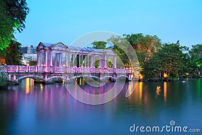 Colorful glass bridge on the lake Stock Photo