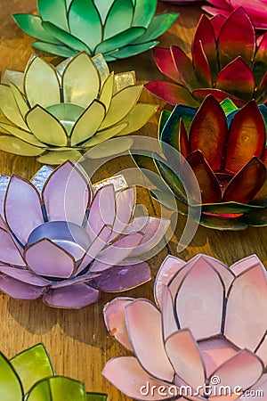 Colorful glass candle holder shaped like a flower Editorial Stock Photo