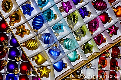 Colorful glass christmas tree balls lying in opened boxes Stock Photo