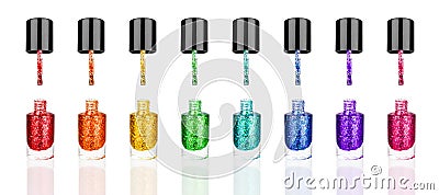 Colorful glittering nail polish glass bottles & brush set white background isolated close up, sequin varnish open containers Stock Photo