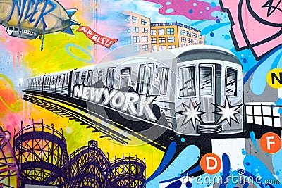 Colorful graffiti in New York City with an image of a subway tra Editorial Stock Photo