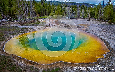 Colorful grand Prismatic Pool, blue and yellow at Yellowstone National Park in a gorgeous sunny day Stock Photo