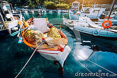 Colorful Greek fishing boats in small port harbor of Kioni on Ithaka island, Greece Editorial Stock Photo