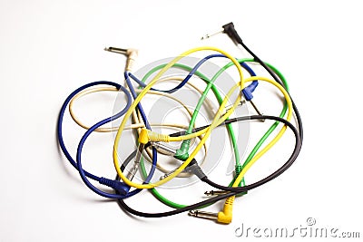 Tangled colorful guitar cable on white background Stock Photo