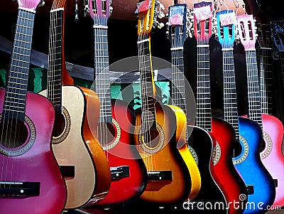 Colorful guitars on display Stock Photo