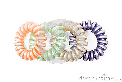 Colorful Hair Band Isolated on White Background with Clipping Path. Closeup of Spiral Four Colorful Rubber Bands for Fashion Stock Photo