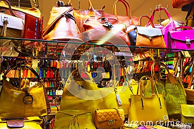 Colorful handbags on display at shop window Editorial Stock Photo