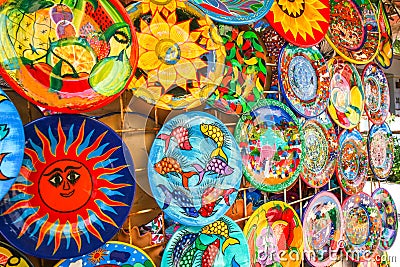 Colorful handmade decorative mexican plates with many patterns o Editorial Stock Photo