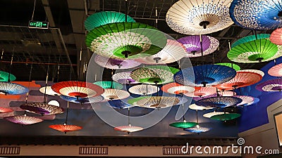 Colorful hanging Japanese umbrella paper indoor decoration Stock Photo